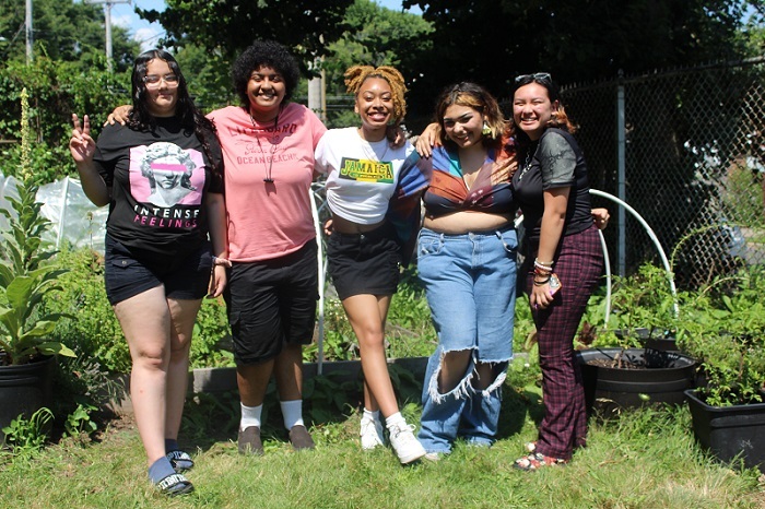 Graduates from the Huneebee Project after a day of honey extraction.